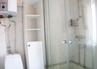 The shower in the bathroom at the large cottage.