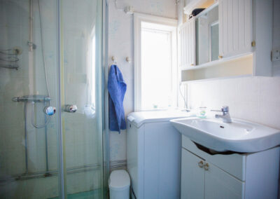 The shower in the bathroom at the large cottage.