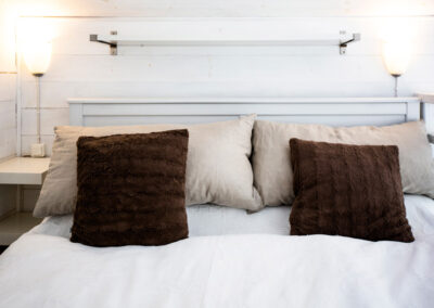 The double bed in the sleeping loft in the little cottage at Rosenberg Farm.