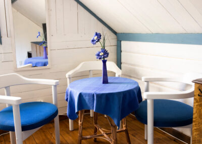 A seating area at one of the bedrooms in the large cottage where you can play cards and hang out.