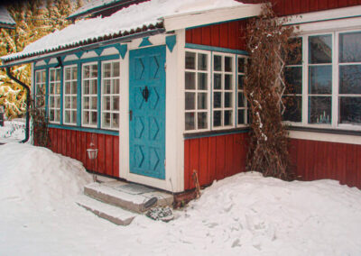The large cottage during winter.